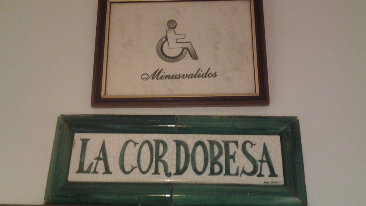 Logotipo de los aseos